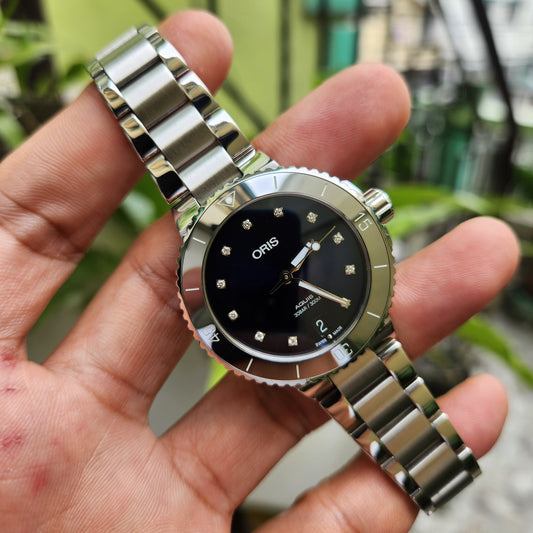 Oris Ladies Aquis Date Tungsten Bezel in Sunray Blue Dial with Diamonds 36mm