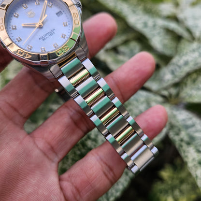 Tag Heuer Ladies Aquaracer Two-Tone Solid Gold 18k Bezel in Mother of Pearl White Dial with Diamonds 32mm