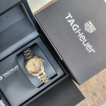 Tag Heuer Ladies Aquaracer Two-Tone Solid Gold 18k Bezel in Mother of Pearl White Dial with Diamonds 32mm