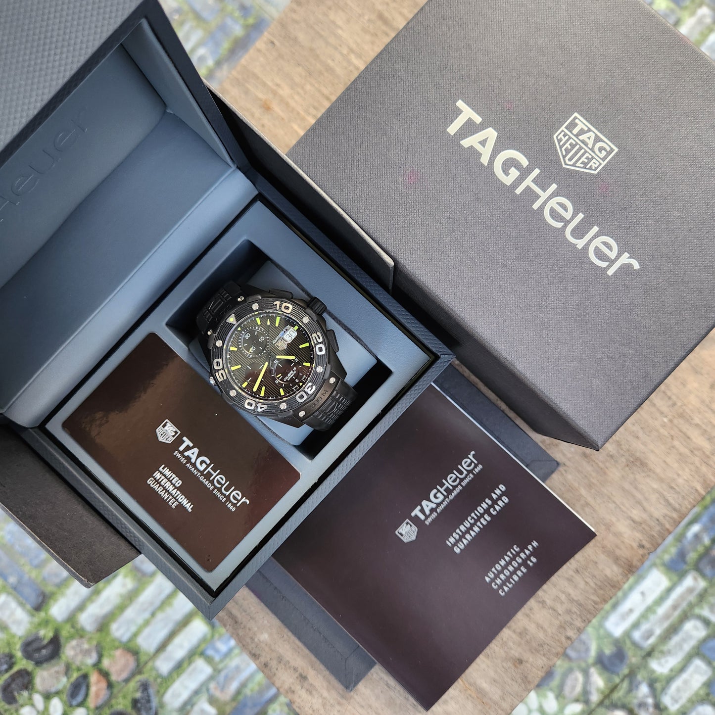 Tag Heuer Aquaracer Chronograph Calibre 16 Titanium PVD Black Engraved Stripes Dial 500M 44mm - Complete Set