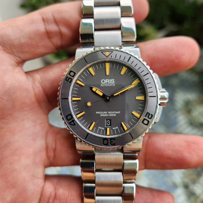 Oris Aquis Date Tungsten Bezel Orange Accent in Grey Dial 43mm - Complete Set