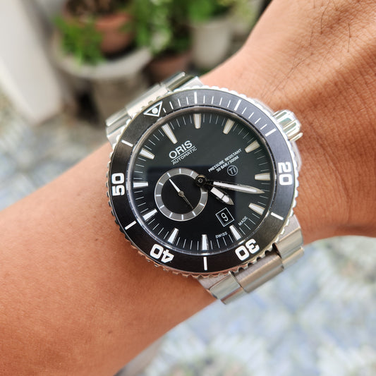 Oris Titan Small Second Date with Ceramic Bezel in Black Dial 46mm